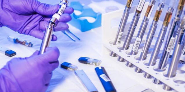 diagnostic-lab-hand-holding-tools